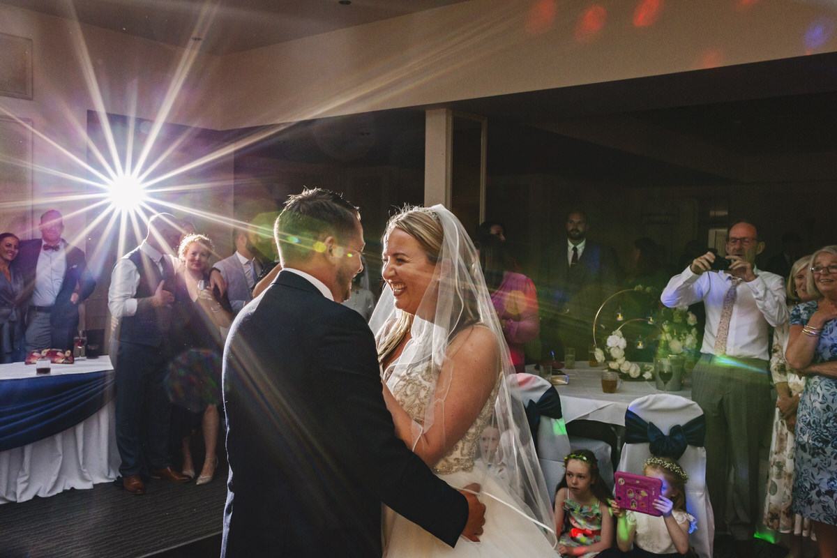 A wedding couple dancing their first dance on their wedding day