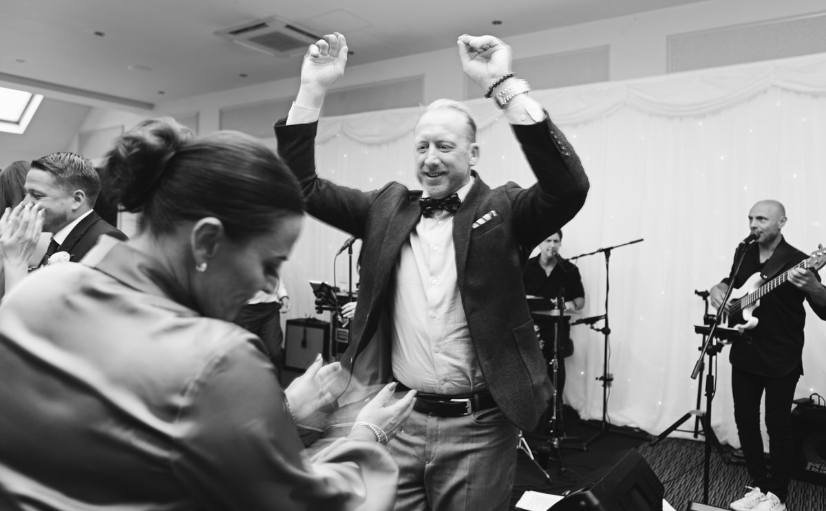 Guests dancing at a wedding reception